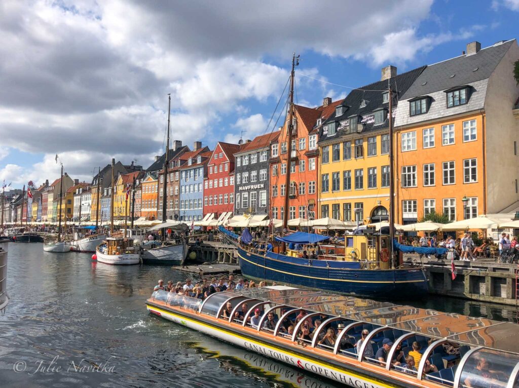 Image of classic architectural buildings along the waterways of Copenhagen, Denmark. Ranked 4th by the 2022 Arcadis Sustainable Cities Index. July 2019 