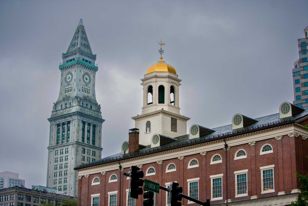 Image of Faneuil Hall and Custom House Tower in Boston, MA. Boston is ranked 22nd on the Arcadis Sustainable Cities Index 2022. 