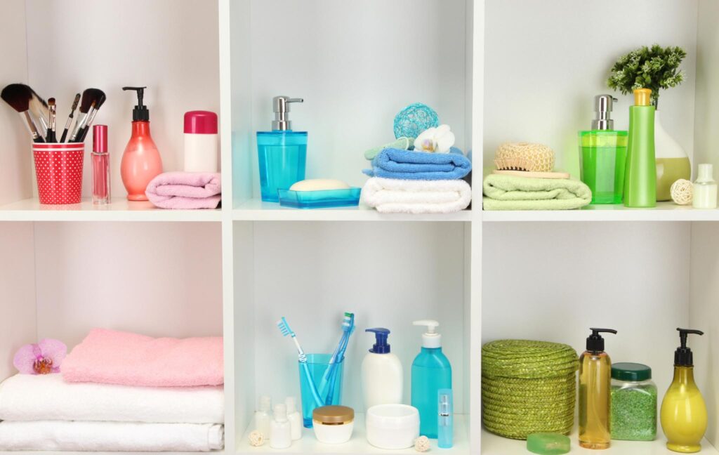 Image of open an shelving cabinet in a bathroom, showing a variety of health and beauty contents inside. The health and beauty industry is starting to offer more sustainable products.