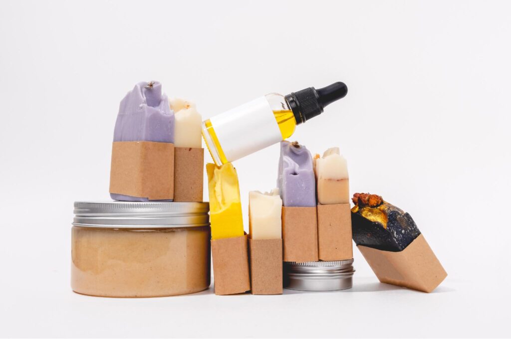 Image of a variety of beauty products with minimal or eco-friendly, recyclable and reusable packaging.