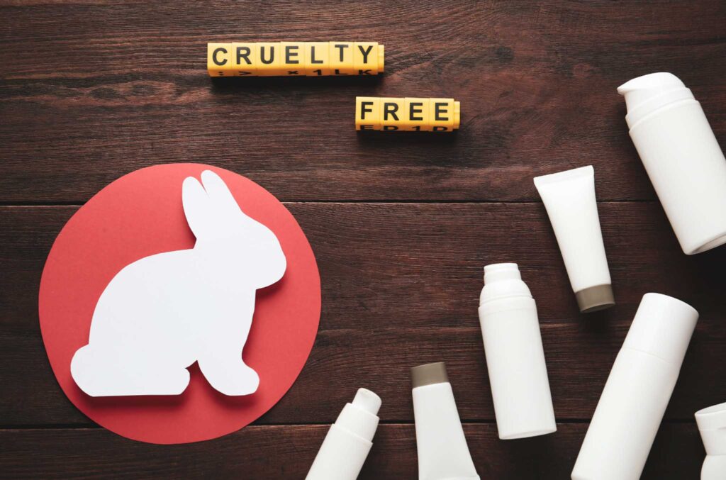 Bird's eye image of a variety of cosmetics bottles next to a symbol of a rabbit and titled "cruelty free" Eco-friendly sunscreens are also not tested on animals and don't contain animal-derived ingredients.