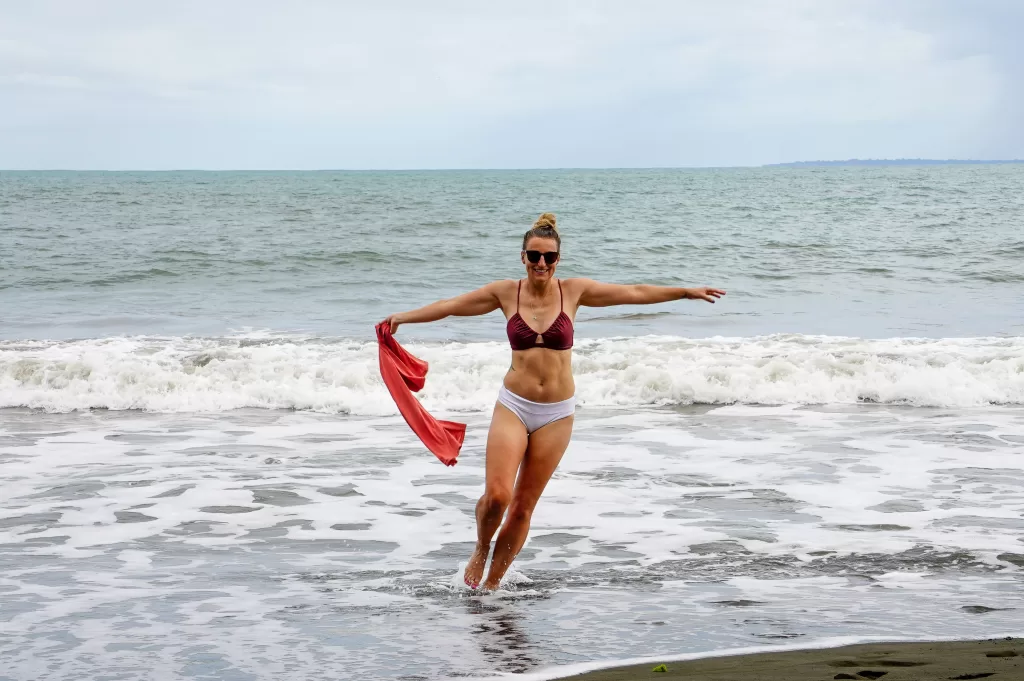 Image of the author of website frolicking in the ocean in Parque Nacional Cahuita, Costa Rica.