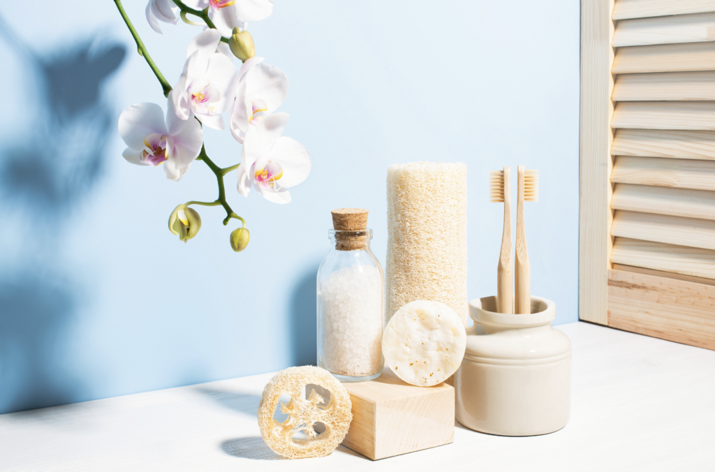 Image of plastic-free personal care products on a counter in a bright room.