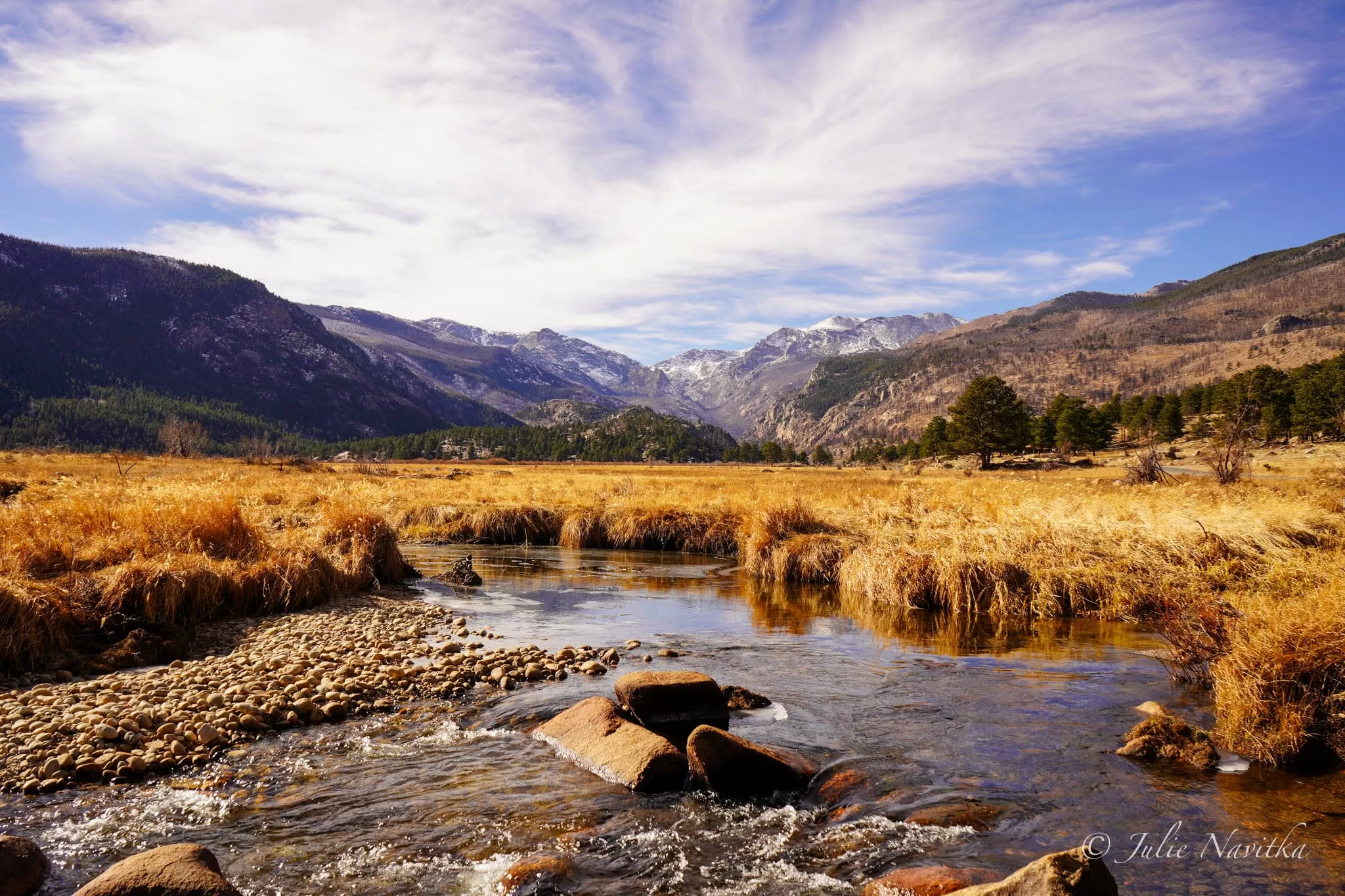 Image of a landscape with a river, meadow, and background mountains in Rocky Mountain National Park, Colorado