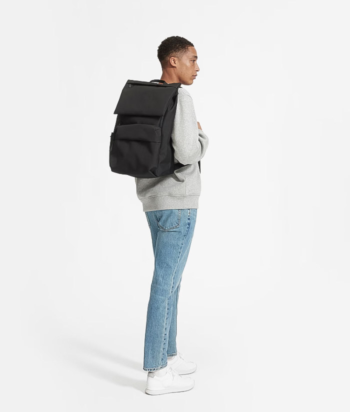 Image of a model wearing The ReNew Transit Backpack by Everlane