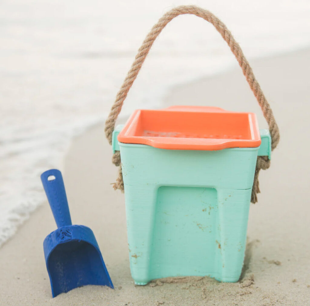 Image of the Rogue Wave Certified Compostable Beach Toys, with pail, shovel and sifter