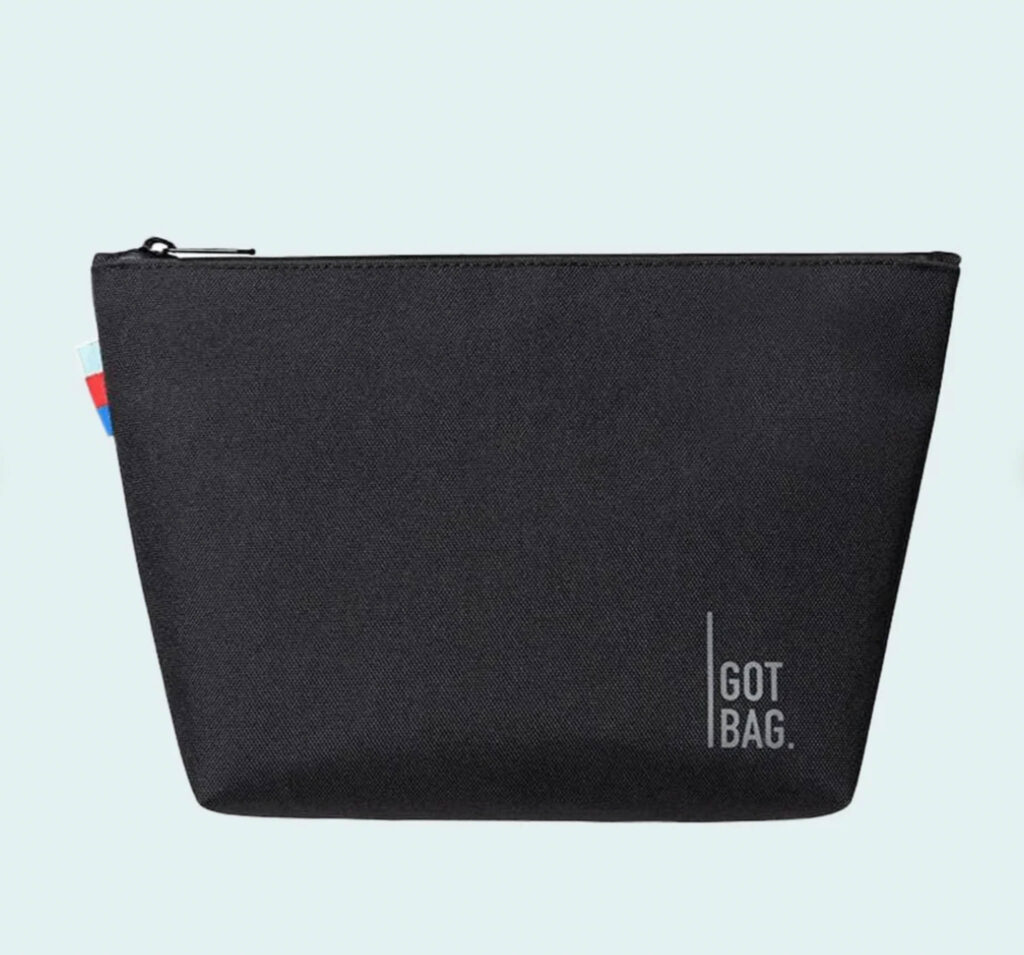 Image of the GOT Shower Bag in black, a great way to keep all your sustainable travel toiletries in one place!
