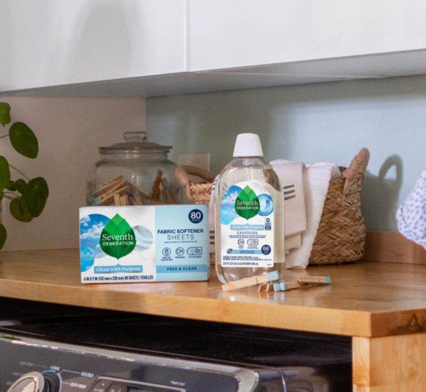Image of a box of eco-friendly fabric softener sheets by Seventh Generation on a laundry room countertop.