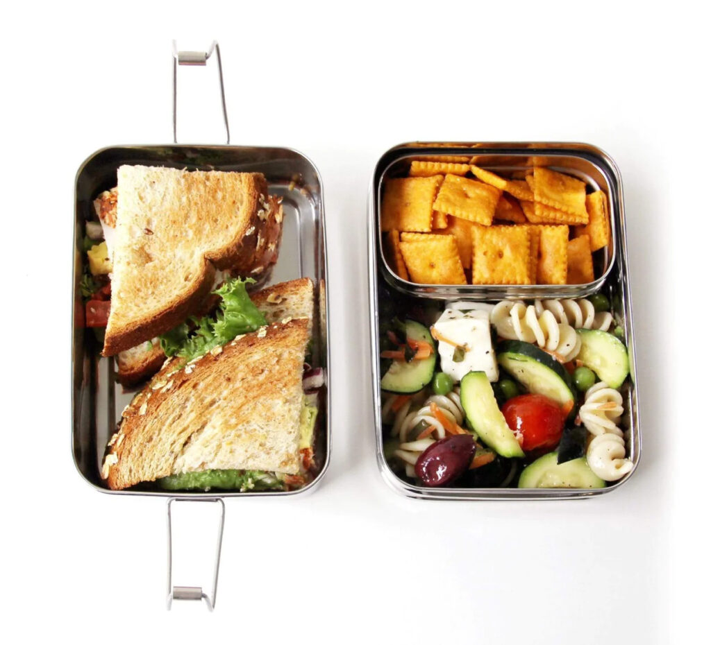 Image of the 3 in 1 classic bento set by ecolunchbox filled with food. Ecolunchbox makes eco-friendly products for students.