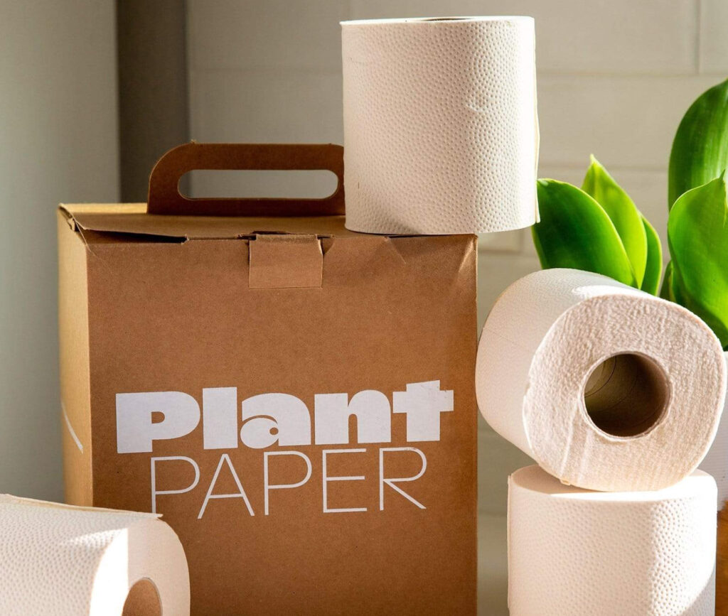 Image of a box of Plant Paper toilet paper with some rolls scattered around. Eco-friendly toilet paper can cut down on your environmental impact. 