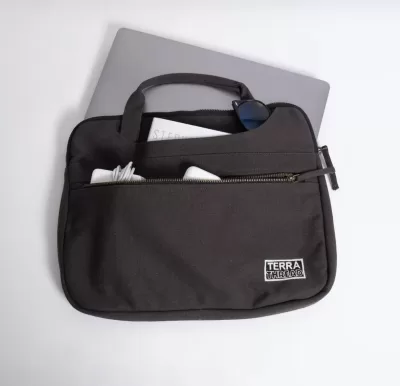 Image of the Hasta Laptop Sleeve with Handles by Terra Thread in black.