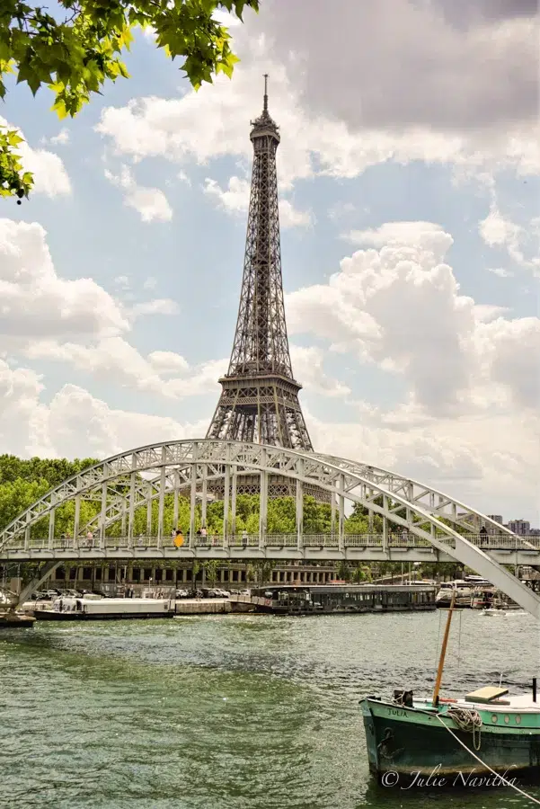 Image of the Eiffel Tower from across the Seine River.