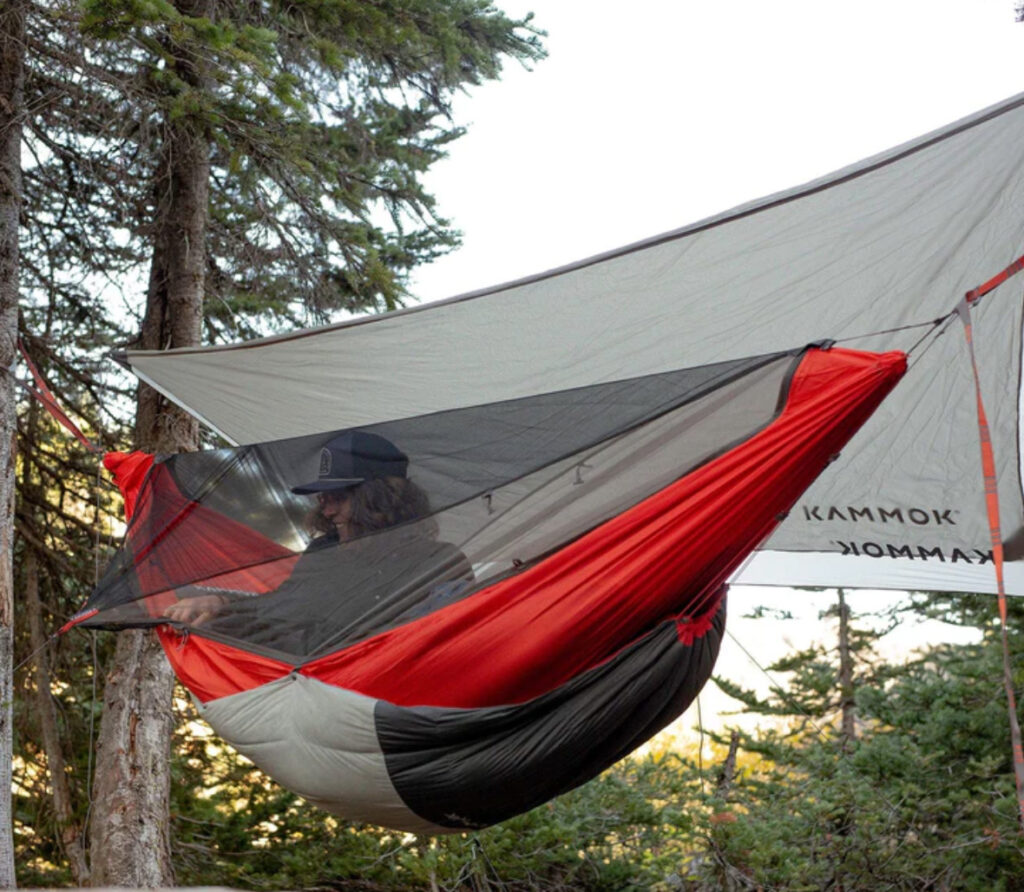 Image of the Mantis all-in-one hammock tent. This piece of eco-friendly camping gear can cut down the weight in your pack when backcountry eco-camping.