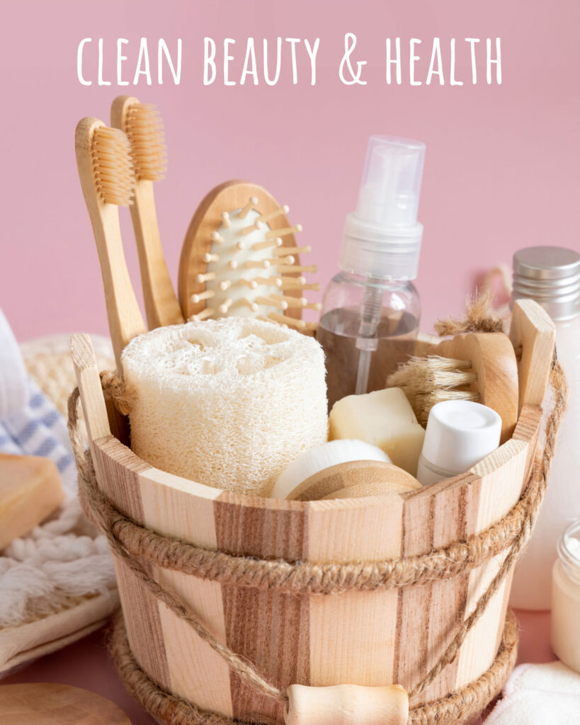 Image of a wooden pail filled with health and beauty items with the title "clean beauty & health" overlaid.