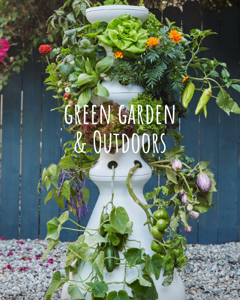 Image of a large planter with may vegetables growing out of it in an outdoor space with the title "green garden & outdoors" overlaid.