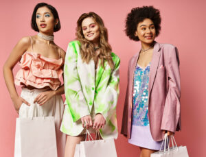 Image of three women wearing colourful and trendy outfits.