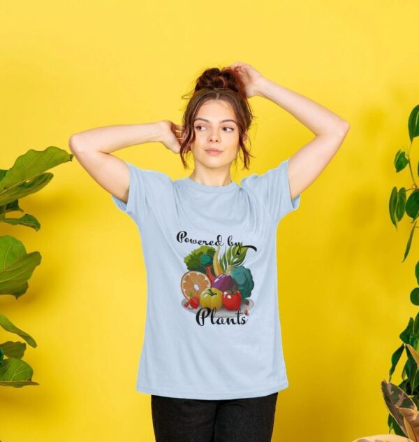 Image of a model wearing the Powered by Plants Tee in Sky Blue