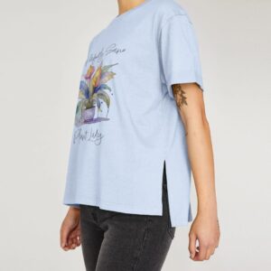 Image of a model wearing the Plant Lady Tee in Sky Blue