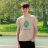 Image of a model wearing the Successfully Sustainable Kids Tee in Oat