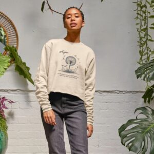 Image of a model wearing the Harmony with Earth Boxy Sweater in Oat.