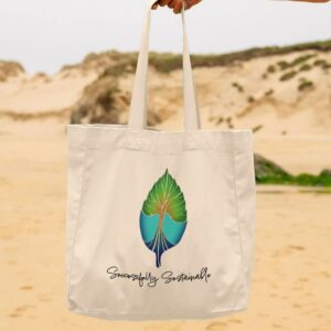 Image of a model holding the Successfully Sustainable tote bag.