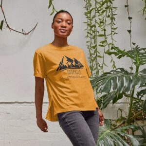 Image of a model wearing the Mountain Lover Tee in Ochre.