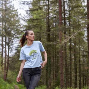 Image of a model wearing the Tree Hugger Boxy Tee in blue