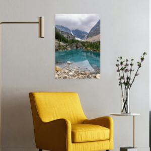 Image of the Mountain Oasis print hung over a chair.