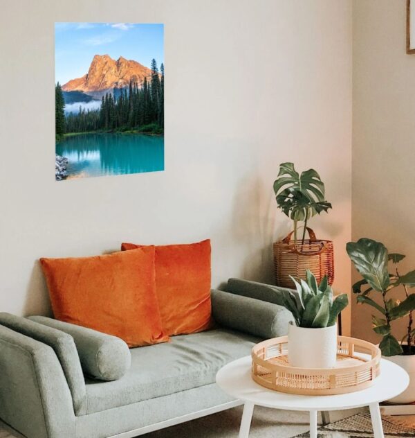 Image of the "Alpine Glow" photography print hung over a sofa.