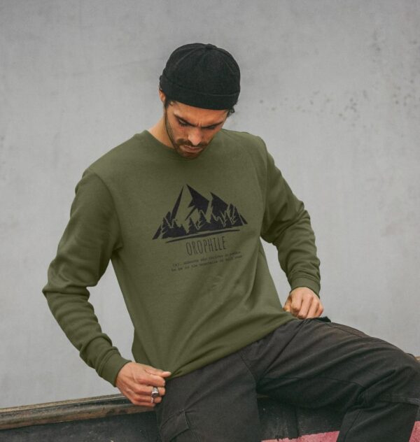 Image of a model wearing the "Mountain Lover Crewneck" in Sage.