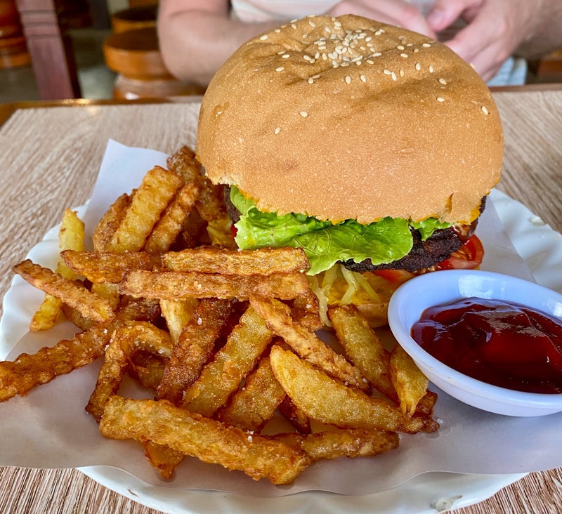 Image of the vegan burger made from locally grown ingredients at Kapphet Vegan Restaurant in Vang Vieng.