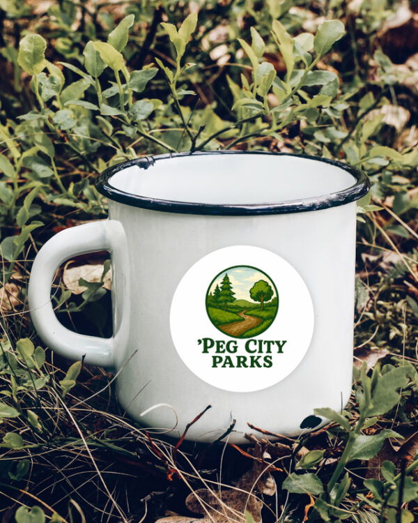 Image of the Peg City Parks circular glossy sticker on a camping mug.